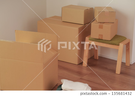 Cardboard boxes packed for moving Cardboard boxes packed for moving 135681432
