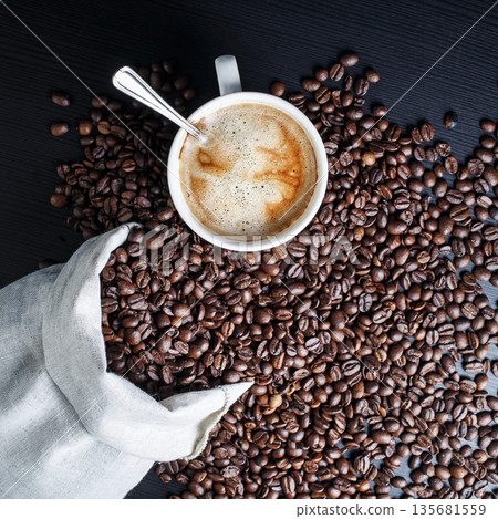 Coffee on black table Coffee on black table 135681559