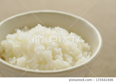 White rice served in a bowl 135682886