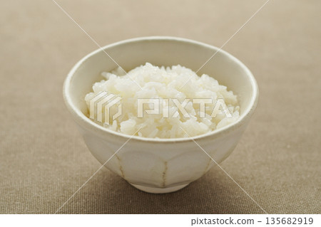 White rice served in a bowl White rice served in a bowl 135682919