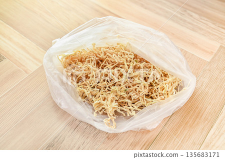 Dried daikon radish in a plastic bag Dried daikon radish in a plastic bag 135683171