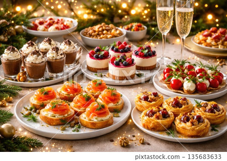 Festive Holiday Table with Gourmet Appetizers Desserts and Champagne Celebration Festive Holiday Table with Gourmet Appetizers Desserts and Champagne Celebration 135683633