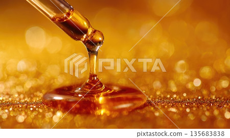 Golden Honey Dripping from Pipette, Natural Sweetness and Organic Food Background Golden Honey Dripping from Pipette, Natural Sweetness and Organic Food Background 135683838
