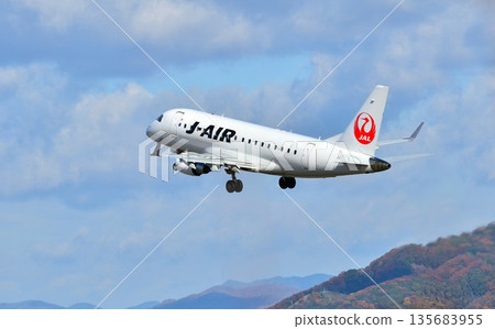 J-AIR takes off from Itami Airport 135683955