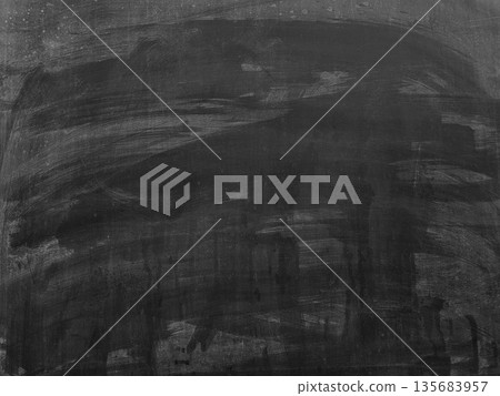 Abstract traces of rubbed out chalk on blackboard. 135683957