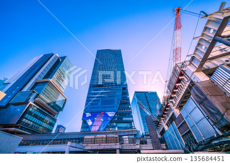 Tokyo cityscape in Japan, including cranes for the Shibuya Station redevelopment project and Shibuya Scramble Square (January 14th) 135684451
