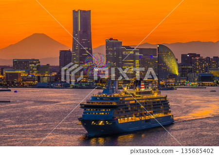 View of the Yokohama cityscape in Japan, including Asuka III, Mount Fuji, and Minato Mirai. Shin-Takashima Island is in the background on the right. 135685402