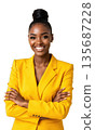 A passionate female business strategist in bright yellow, surrounded by a halo of glowing business solutions, representing her emotional energy 135687228