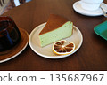 korea cafe slice of matcha cheesecake on a white plate 135687967