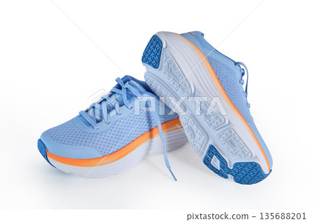 Blue and orange athletic running shoes on white background Blue and orange athletic running shoes on white background 135688201