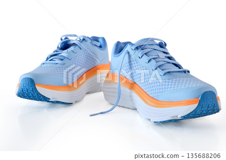 Blue orange running shoes for athletic activity Blue orange running shoes for athletic activity 135688206