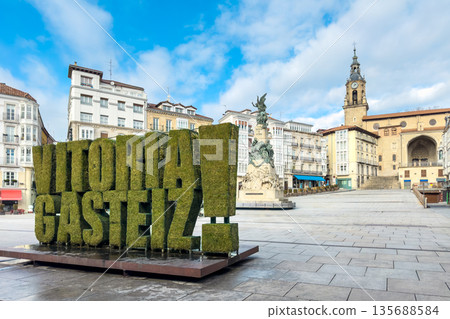 Virgen Blanca Square in Vitoria Gasteiz, featuring the iconic green city sign urban atmosphere in Virgen Blanca Square in Vitoria Gasteiz, featuring the iconic green city sign urban atmosphere in 135688584