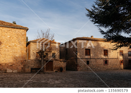 Medinaceli medieval village street with traditional stone house Medinaceli medieval village street with traditional stone house 135690579