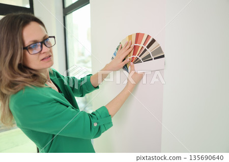 Exploring color palettes while designing a modern office space in a bright and airy environment Exploring color palettes while designing a modern office space in a bright and airy environment 135690640