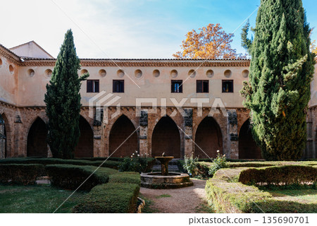 Monasterio de Piedra cloister with stone arches and sunlight in Zaragoza, Spain 135690701