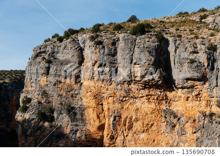 River Mesa canyon rock layers at Sanctuary of Our Lady of Jaraba River Mesa canyon rock layers at Sanctuary of Our Lady of Jaraba 135690708