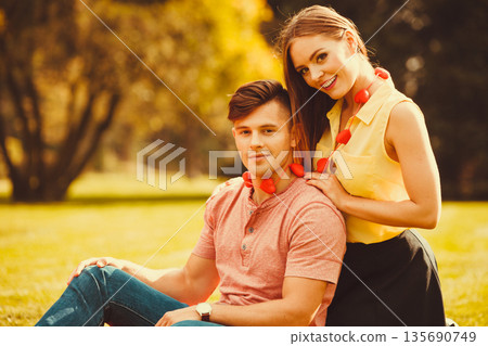 Affectionate couple cheering together. Affectionate couple cheering together. 135690749