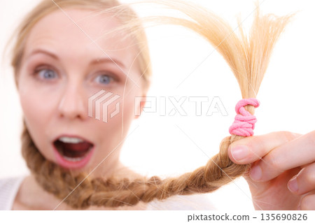 Blonde girl with braid hair Blonde girl with braid hair 135690826