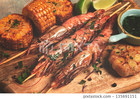 langoustines on skewers, shrimp kebab, with fried corn, spices and herbs, homemade, no people, 135691151