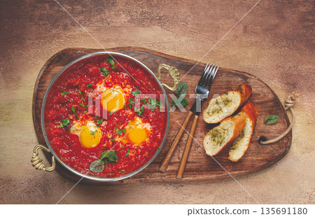 shakshuka, breakfast, fried eggs in tomato sauce, with spices and herbs, homemade, no people, 135691180