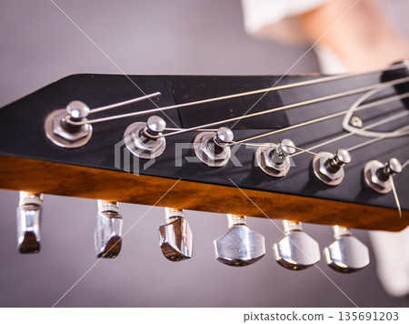 Close up on guitar fretboard 135691203