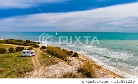 Caravan camping on coast. Aerial view 135691229