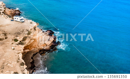Camper on coast in Spain. Aerial view 135691350