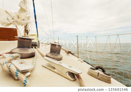 Yacht capstan on sailing boat during cruise Yacht capstan on sailing boat during cruise 135691546