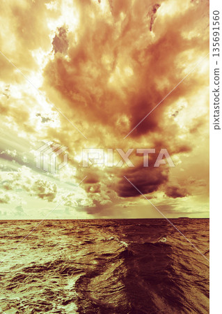 Beautiful sunset on the ocean sea Beautiful sunset on the ocean sea 135691560