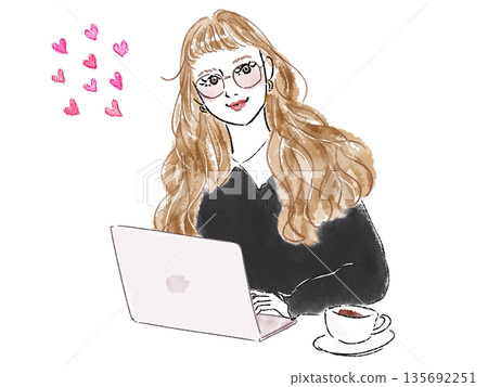 A woman using a computer 135692251