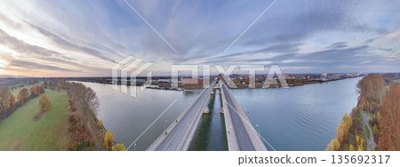 Symmetric aerial panorama of Rhine bridge Worms city Symmetric aerial panorama of Rhine bridge Worms city 135692317