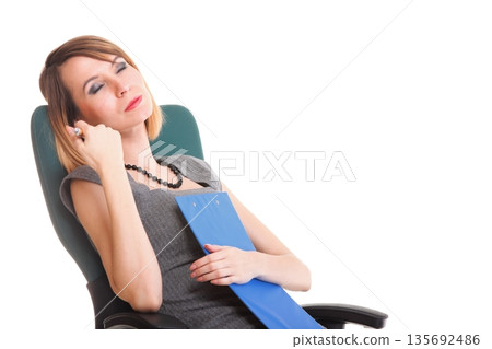 young business woman sitting with her clipboard isolated young business woman sitting with her clipboard isolated 135692486