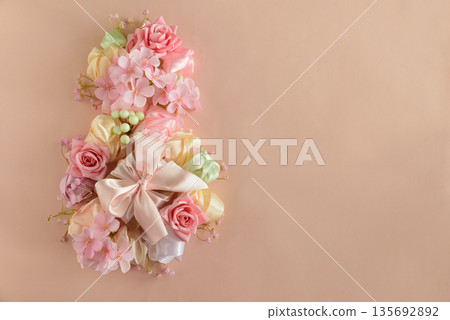 Floral Number Eight with Satin Bow. Elegant Womens Day Decoration on Pink Background 135692892