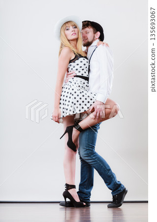 Young happy couple dancing Young happy couple dancing 135693067