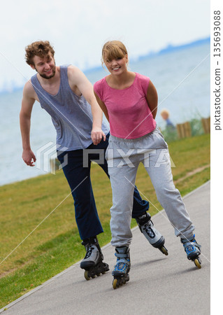 Couple showing affection during ride. Couple showing affection during ride. 135693088
