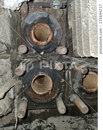 Limescale Deposits Build up in Pipes Located in an Industrial Setting During Maintenance Check Limescale Deposits Build up in Pipes Located in an Industrial Setting During Maintenance Check 135694217