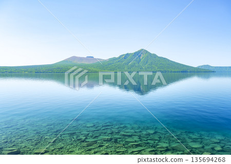 Lake Shikotsu, Mt. Tarumae, and Mt. Fuppushi in early summer, Chitose City Lake Shikotsu, Mt. Tarumae, and Mt. Fuppushi in early summer, Chitose City 135694268