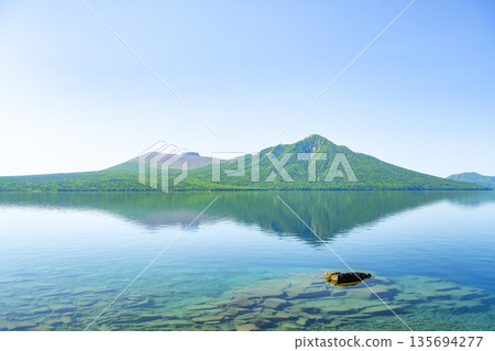 Lake Shikotsu, Mt. Tarumae, and Mt. Fuppushi in early summer, Chitose City Lake Shikotsu, Mt. Tarumae, and Mt. Fuppushi in early summer, Chitose City 135694277