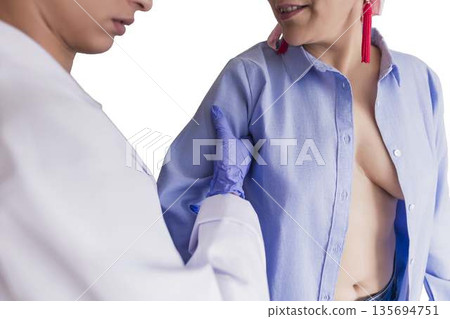 Doctor performing breast examination for breast cancer detection 135694751