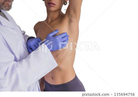 Doctor performing breast examination for breast cancer detection 135694756