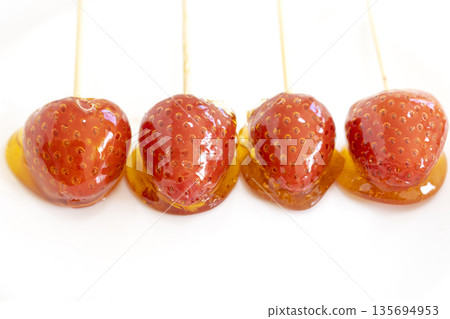 Four handmade strawberry candies (white background, copy space) Four handmade strawberry candies (white background, copy space) 135694953