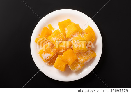 Frozen cut mango Frozen cut mango 135695779