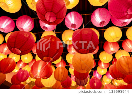Festival colors: lanterns hanging on the ancient road Festival colors: lanterns hanging on the ancient road 135695944
