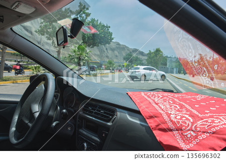 Driving home on a sunny day in a car Driving home on a sunny day in a car 135696302