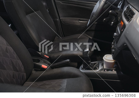Car interior with front seats and dashboard details Car interior with front seats and dashboard details 135696308