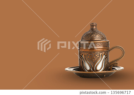 Decorative coffee cup symbolizes hospitality and celebration Decorative coffee cup symbolizes hospitality and celebration 135696717