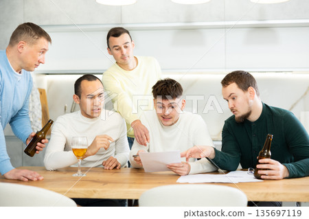 Friends comforting upset man receiving unpleasant news Friends comforting upset man receiving unpleasant news 135697119