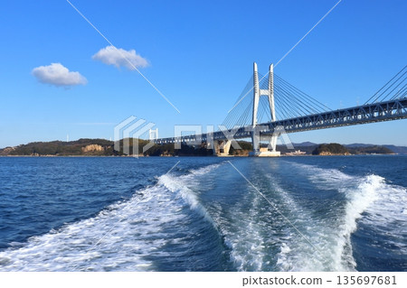 The Seto Ohashi Bridge seen from a boat passing under it, with the view towards Hitsuishijima Island 135697681