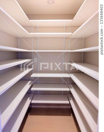 Pantry with adjustable shelves for easy organization Pantry with adjustable shelves for easy organization 135698403