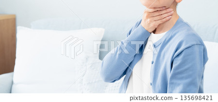 Senior woman with sore throat 135698421